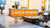 Laser power measurement device in a workshop with digital displays and controls.